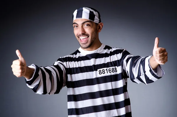 Convict criminal in striped uniform — Stock Photo, Image