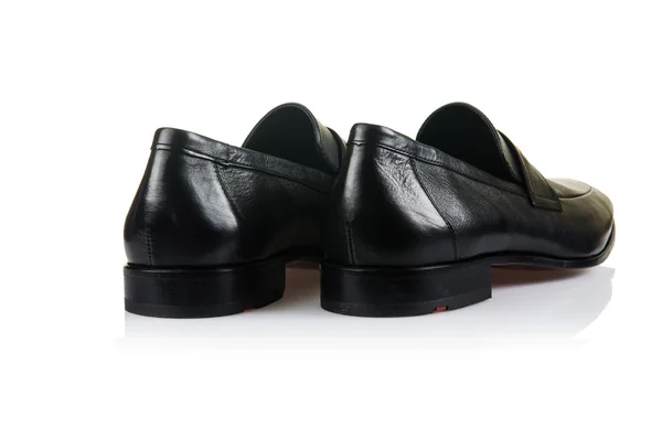 Мода концепция с мужской обуви на белом — стоковое фото