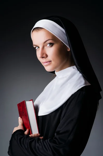 Young nun in religious concept — Stock Photo, Image