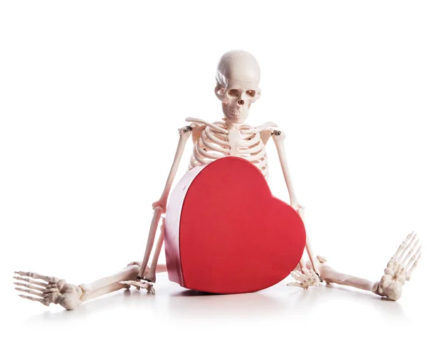 Love concept with skeleton and giftbox — Stock Photo, Image