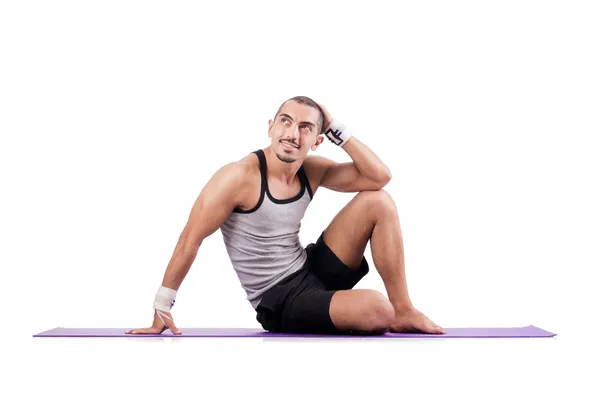 Man doing exercises on white — Stock Photo, Image