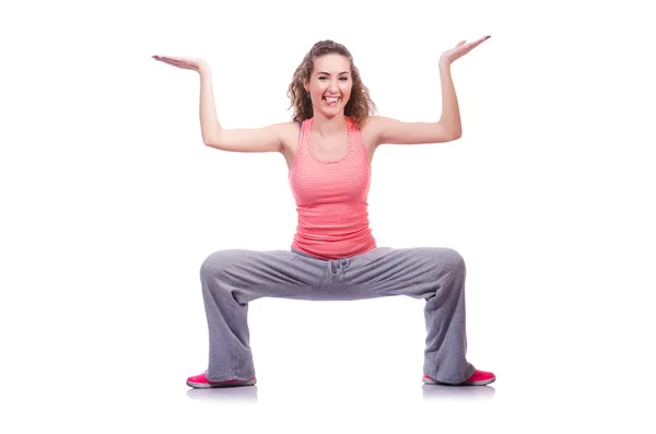 Jovem do sexo feminino fazendo exercícios em branco — Fotografia de Stock