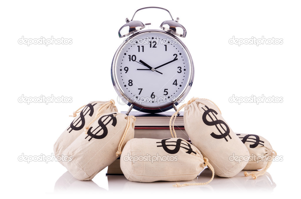 Sacks of money and alarm clock on white