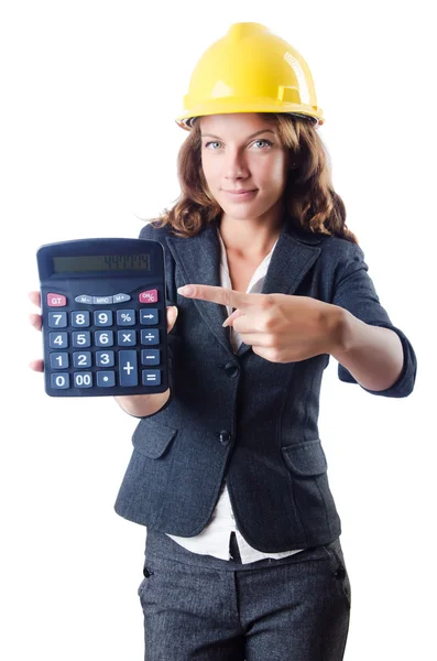 Female builder with calculator on white — Stock Photo, Image