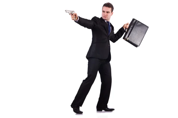 Бизнесмен с пистолетом изолирован на белом — стоковое фото
