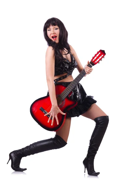 Jonge zanger in lederen kostuum met gitaar — Stockfoto