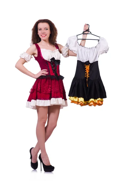 Frau versucht, Kleid auf weiß zu wählen — Stockfoto