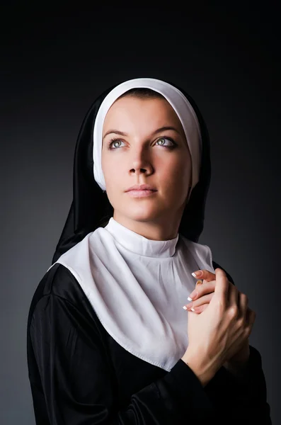 Young nun in religious concept — Stock Photo, Image