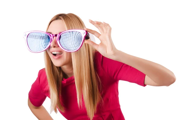 Tall model with giant sunglasses on white — Stock Photo, Image