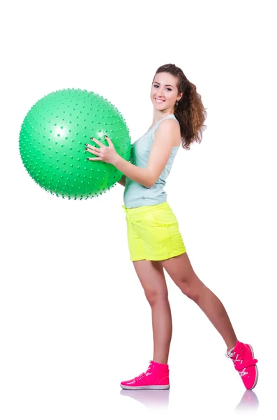 Young woman with ball exercising on white — Stock Photo, Image