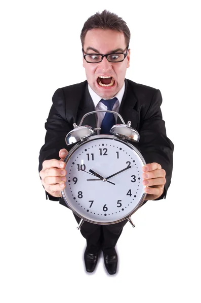 Funny businessman with gian clock on white — Stock Photo, Image