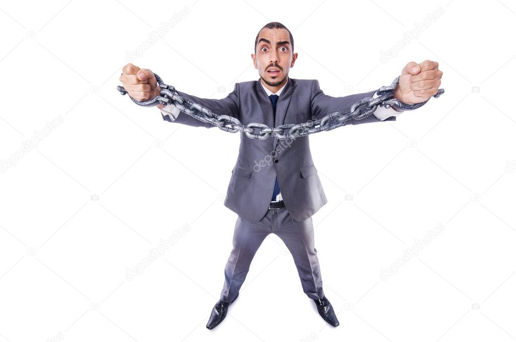 Businessman with handcuffs on white