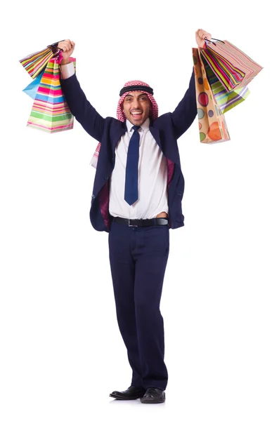 Arab man with shopping gifts on white — Stock Photo, Image