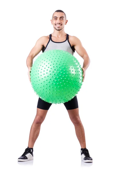 Man with swiss ball doing exercises on white — Stock Photo, Image