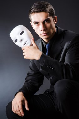 Man with mask in the dark clipart