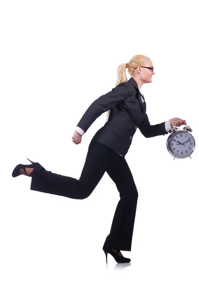 Kvinna med jätte klocka på vit — Stockfoto