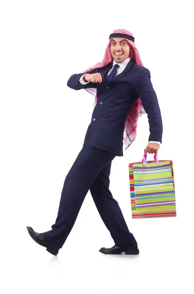 Arab man with shopping gifts on white — Stock Photo, Image