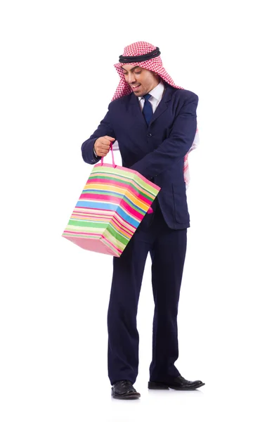 Homem árabe com presentes de compras em branco — Fotografia de Stock