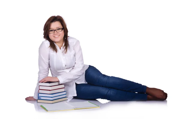 Studente con libri isolati su bianco — Foto Stock