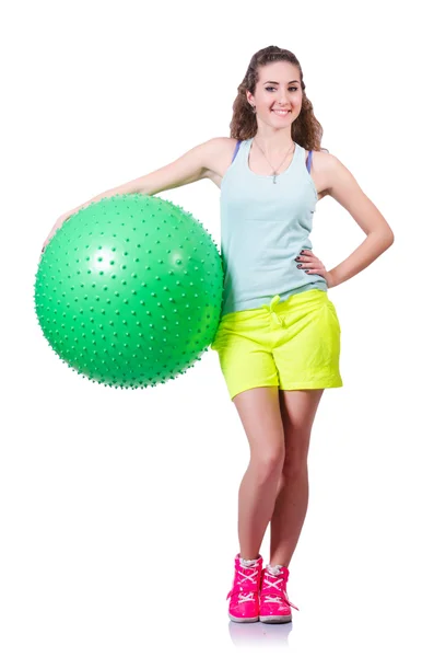 Young woman with ball exercising on white — Stock Photo, Image