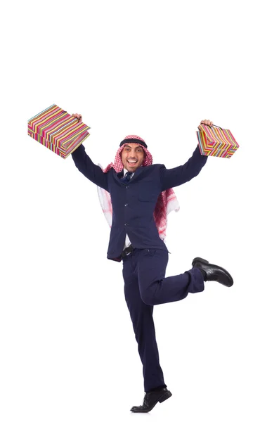 Arab man with shopping gifts on white — Stock Photo, Image