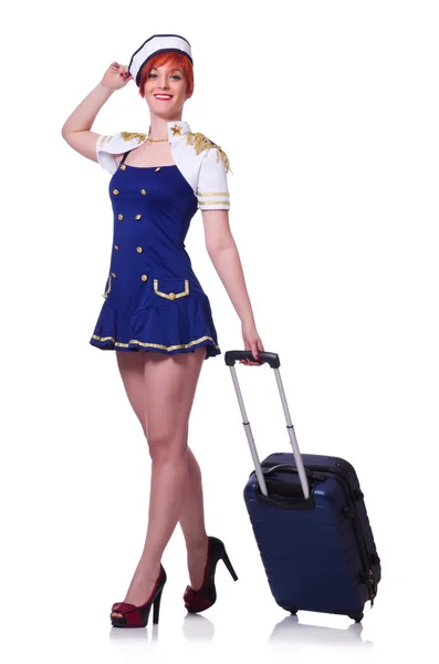 Woman travel attendant with suitcase on white — Stock Photo, Image