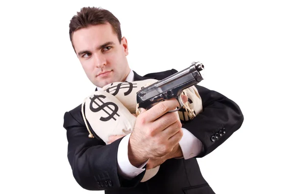 Hombre con arma y sacos de dinero — Foto de Stock