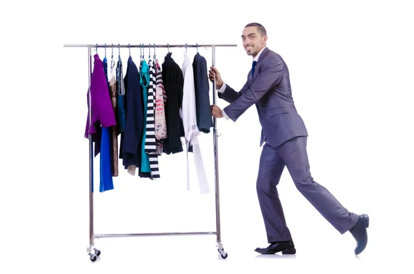 Biznesmen z rack odzież — Zdjęcie stockowe