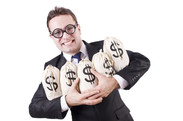 Geschäftsmann mit Säcken voller Geld auf weißem Grund — Stockfoto