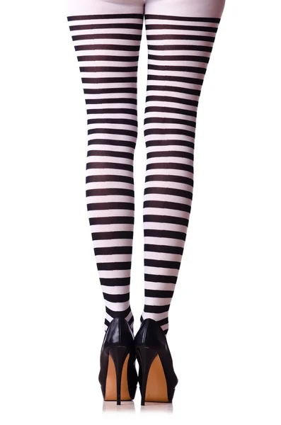 Woman legs in black and white stockings — Stock Photo, Image