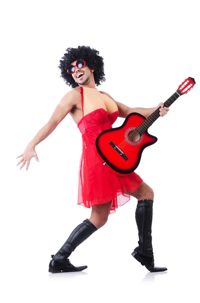 Man in woman clothing with guitar — Stock Photo, Image