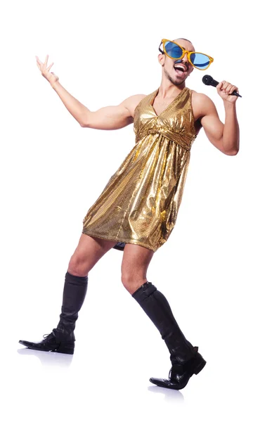 Man in female clothing singing with mic — Stock Photo, Image