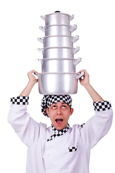 Cook with stack of pots on white — Stock Photo, Image