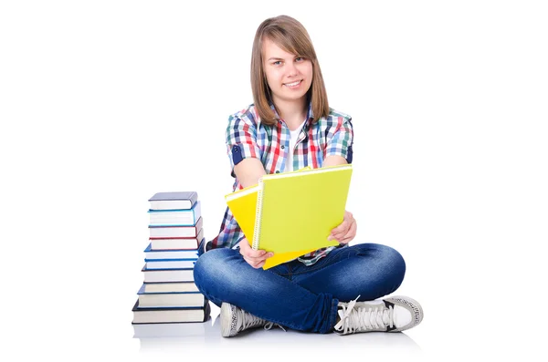 Chica estudiante con libros en blanco — Foto de Stock