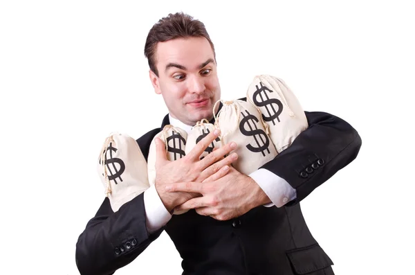 Człowiek z workami na pieniądze na bieli — Zdjęcie stockowe