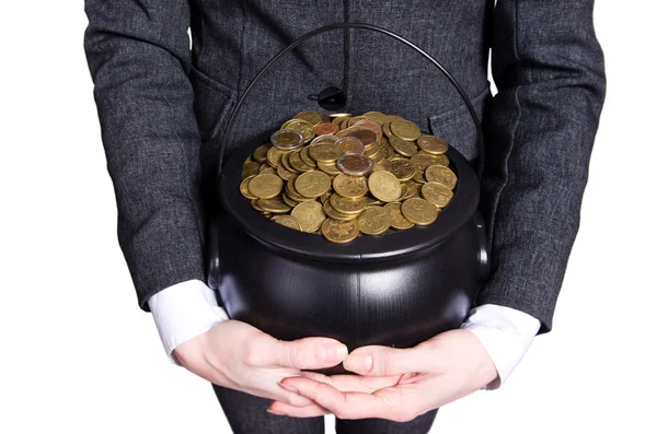 Woman holding pot of gold coins — Stock Photo, Image