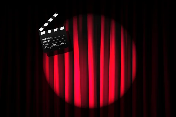 Movie clapper board against curtain — Stock Photo, Image