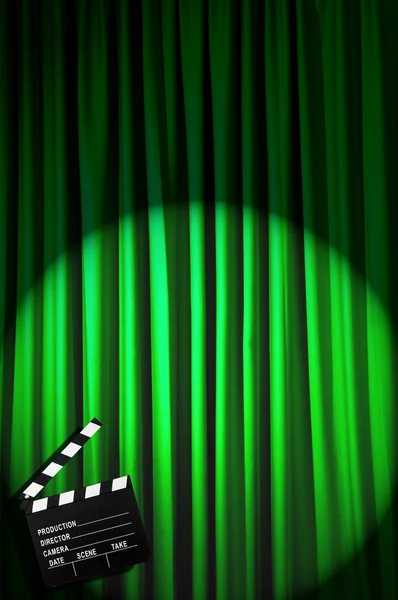 Movie clapper board against curtain — Stock Photo, Image