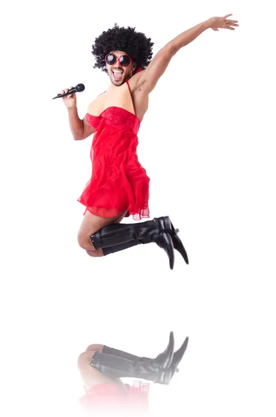 Man in female clothing singing with mic — Stock Photo, Image