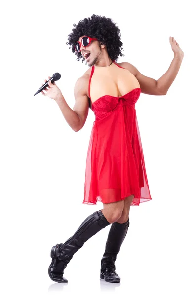 Man in female clothing singing with mic — Stock Photo, Image