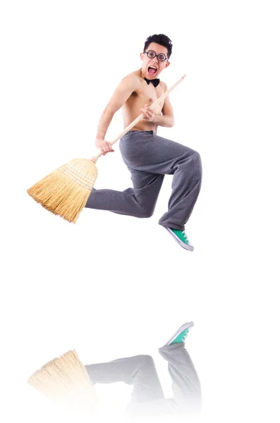 Hombre divertido con escoba en blanco — Foto de Stock