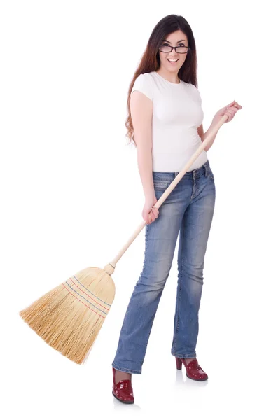 Young woman with broom isolated on white — Stock Photo, Image