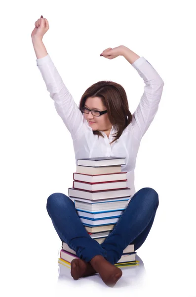 Estudiante con libros aislados en blanco — Foto de Stock