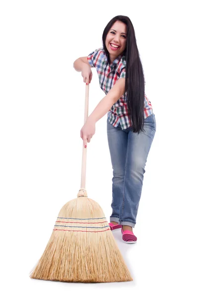 Young woman with broom isolated on white — Stock Photo, Image