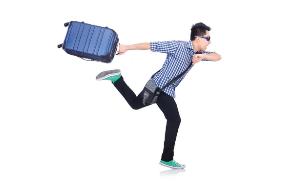 Junger Mann mit Reisetasche auf weiß — Stockfoto