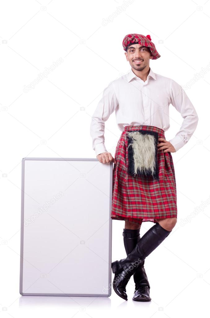 Scotsman with blank board on white