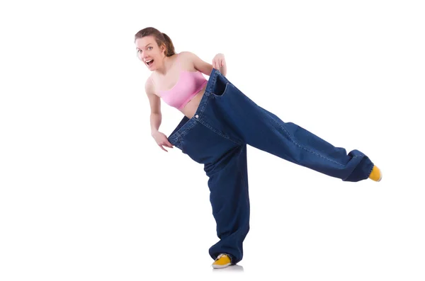 Woman in dieting concept with big jeans — Stock Photo, Image