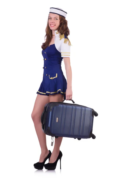 Woman travel attendant with suitcase on white — Stock Photo, Image