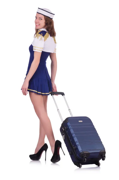 Woman travel attendant with suitcase on white — Stock Photo, Image