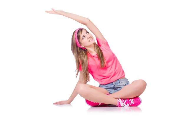 Mladá žena dělá cvičení na bílém — Stock fotografie